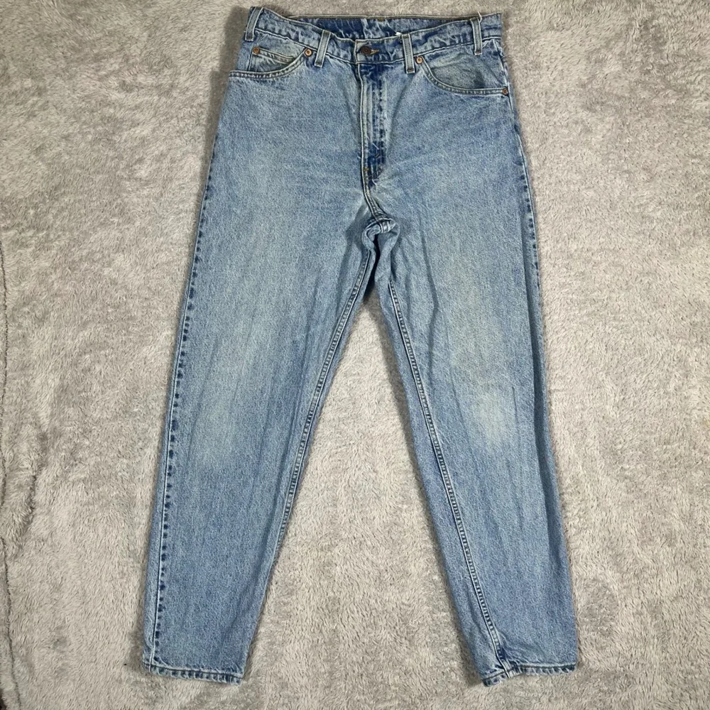 Vintage Levis 550 Relaxed Fit Tapered Leg Jeans Light Wash Orange Tab 34 Trash
